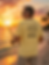 man wearing a yellow T-shirt with funny graphic