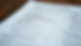 Eye-level view of a neatly organized resume with military service details and civilian job titles