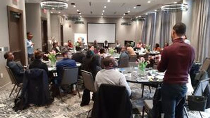 people sitting in a meeting