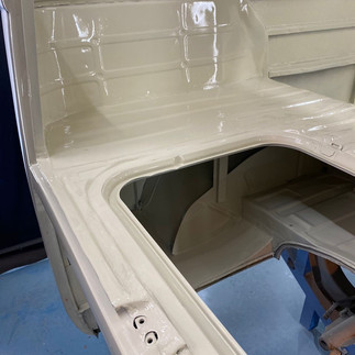 Interior auto body freshly painted base white.