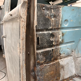 damaged VW frame on body before restoration.