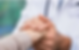 Doctor holding a person's hand.