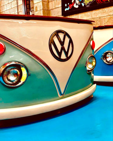 Green TV stand made from VW Bus front end