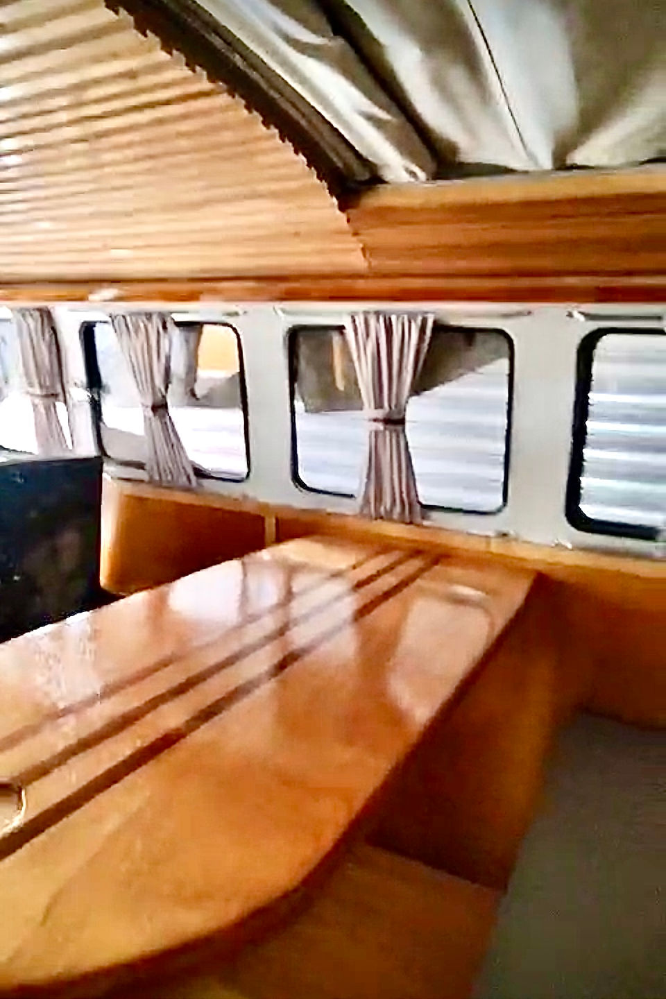 interior detail view of table and ceiling in acerola orange vw bus