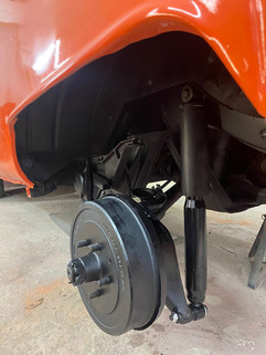 detail view of renovated drum brakes acerola orange vw bus