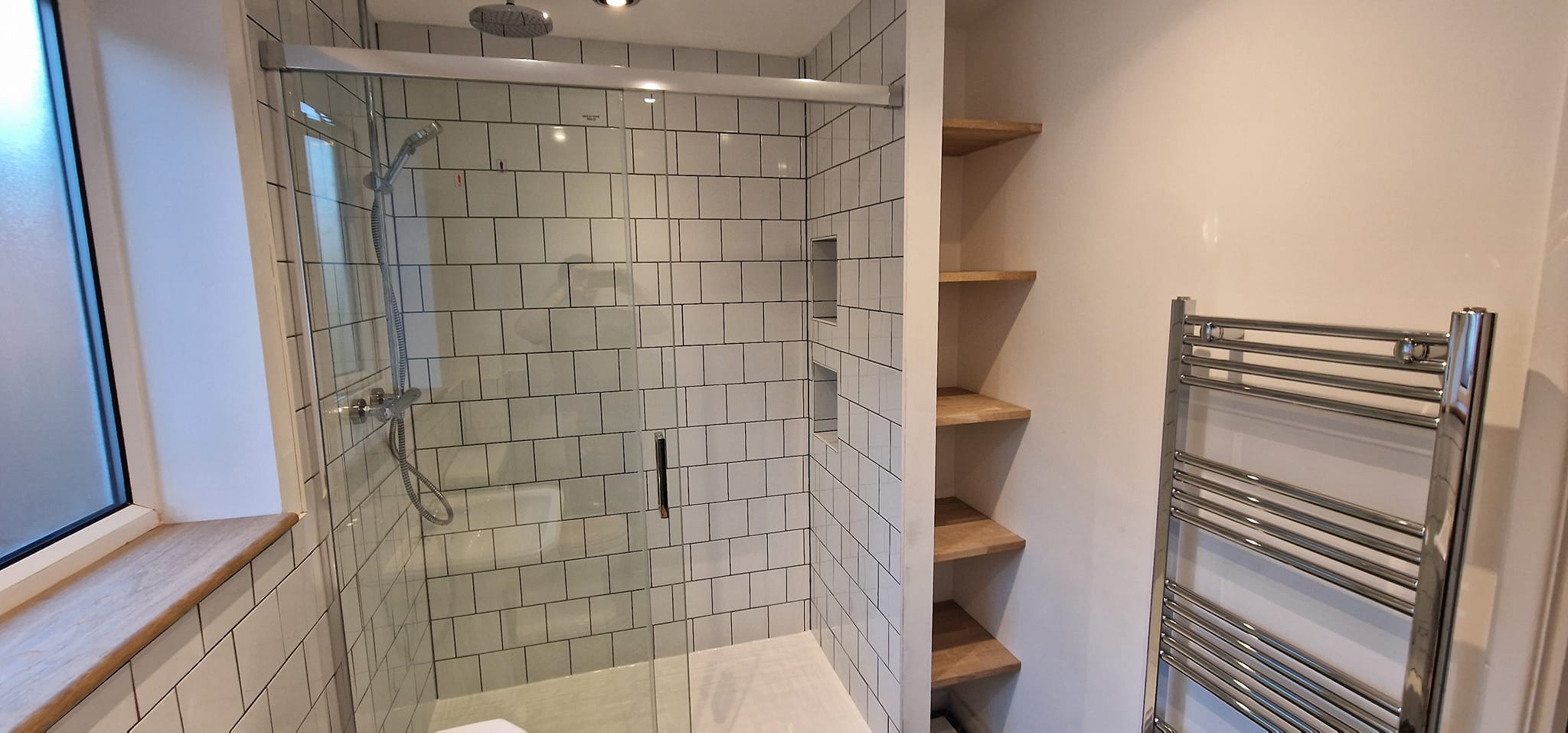 White-tiled bathroom refurbishment