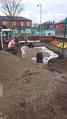 Groundwork preperation completed, KF Earthworks branded excavator in the background