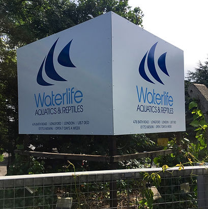 A huge sign for a business in an industrial estate, business is for aquatic life