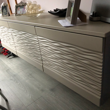Bespoke storage unit with wavy doors