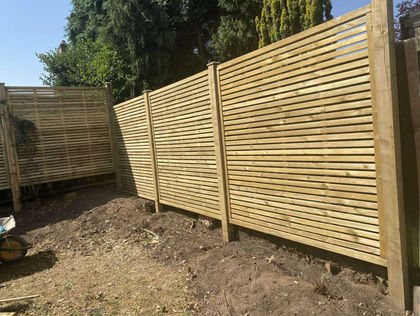 New wooden fence installed along with a new patio in back garden