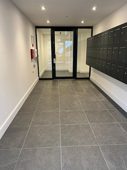 A freshly cleaned and mopped floor to a new block of flats