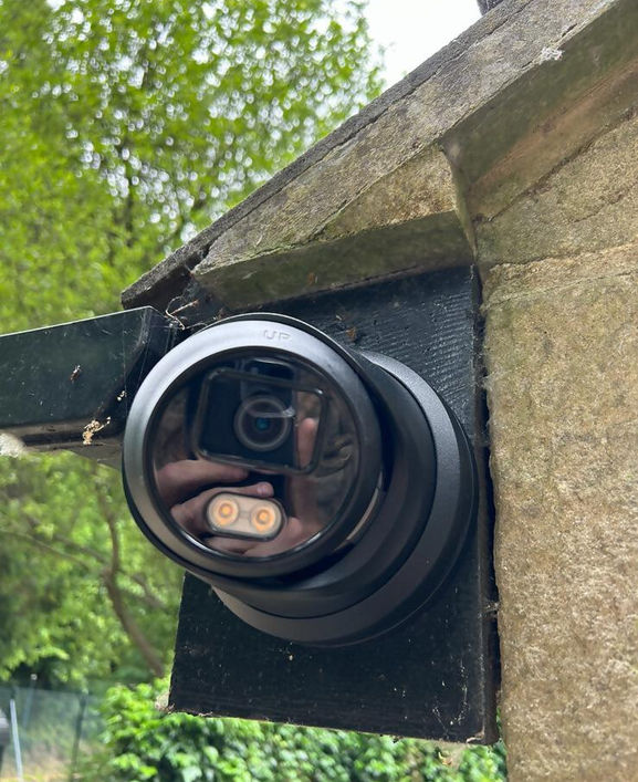 CCTV camera installed on the exterior of a property facing camera