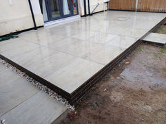 New patio installed in garden by TDax Construction