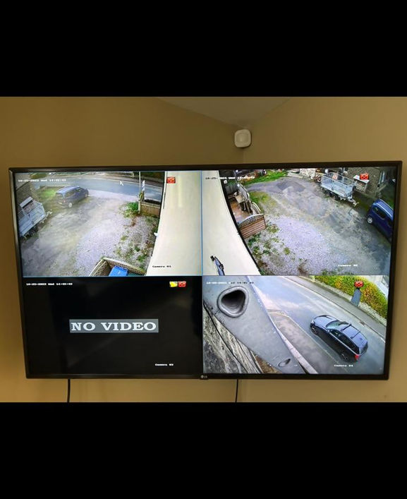 CCTV camera system on monitor showing outside of premises