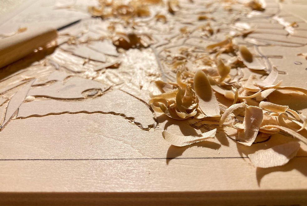 Carved shina plywood with wood shavings and Japanese carving tool
