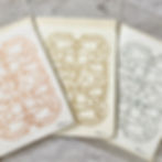 Original printed cards in copper, gold and silver in compostable cellophane packaging