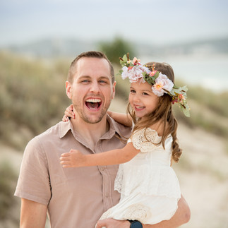 dad and daughter laughing at Currumbin Alley Beach Gold Coast