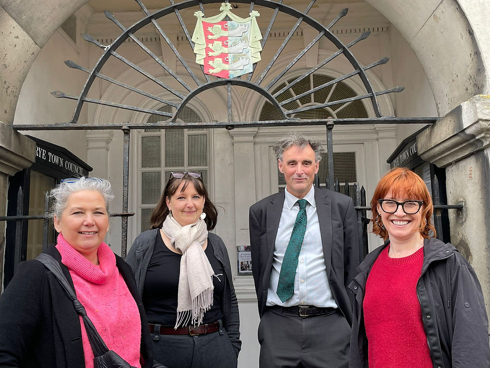 standing outside the town hall