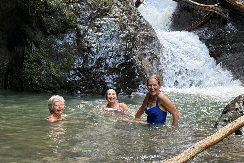 Refreshing in the waterfall pool at the end of your hiking day