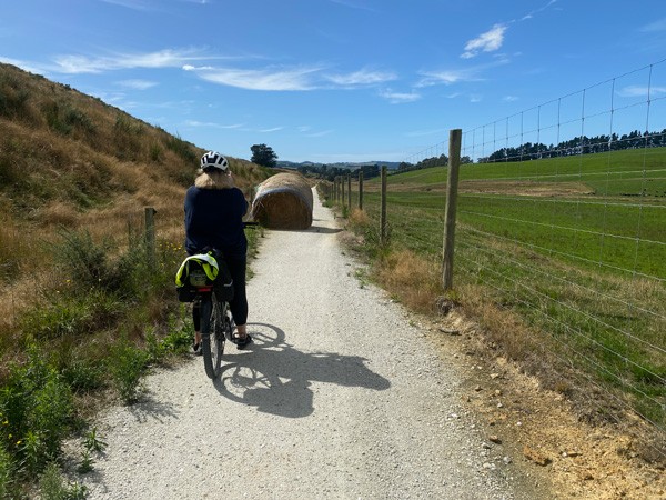 woman cyclist overcoming obstacles