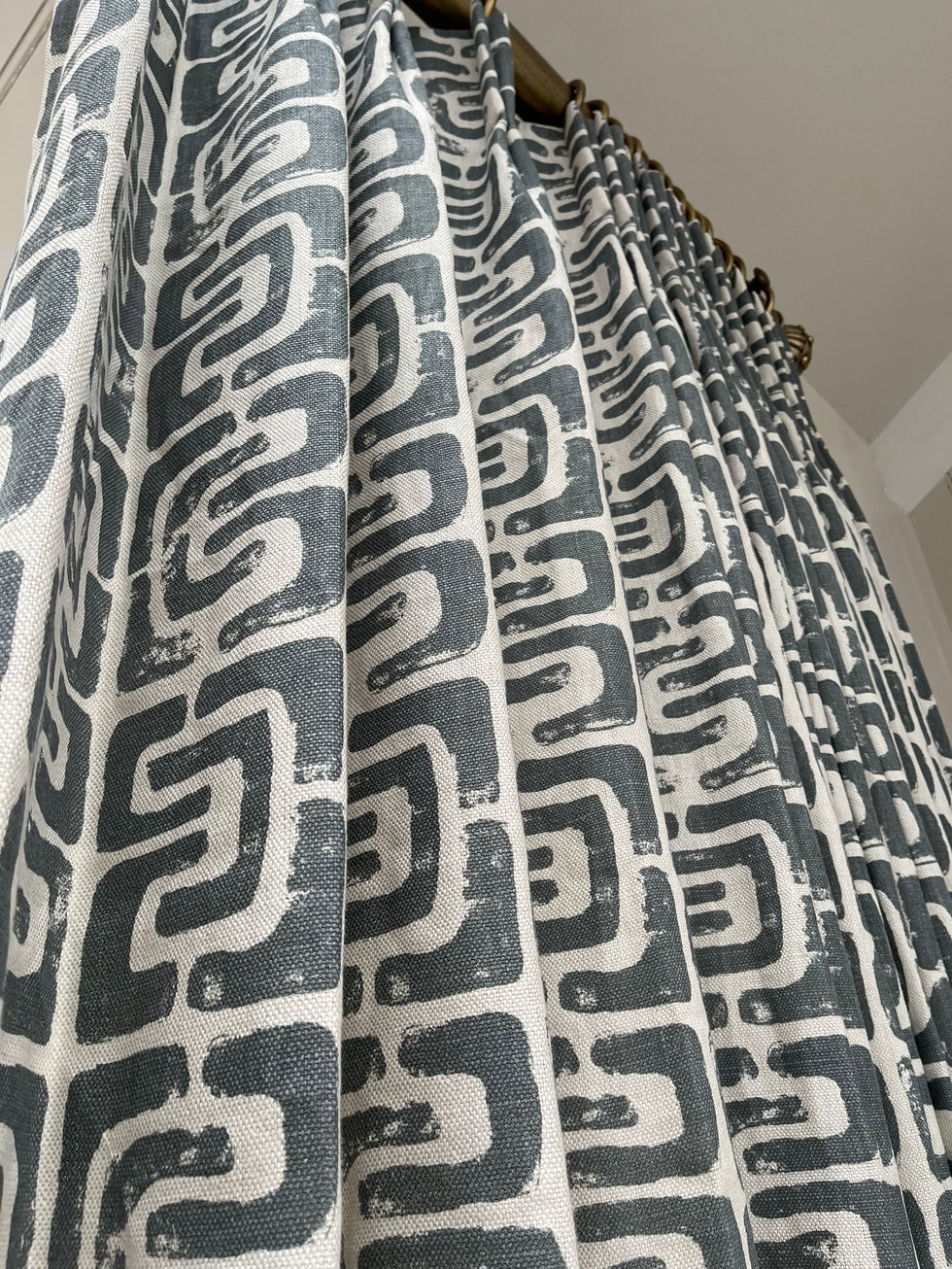 Curtains pleated to pattern