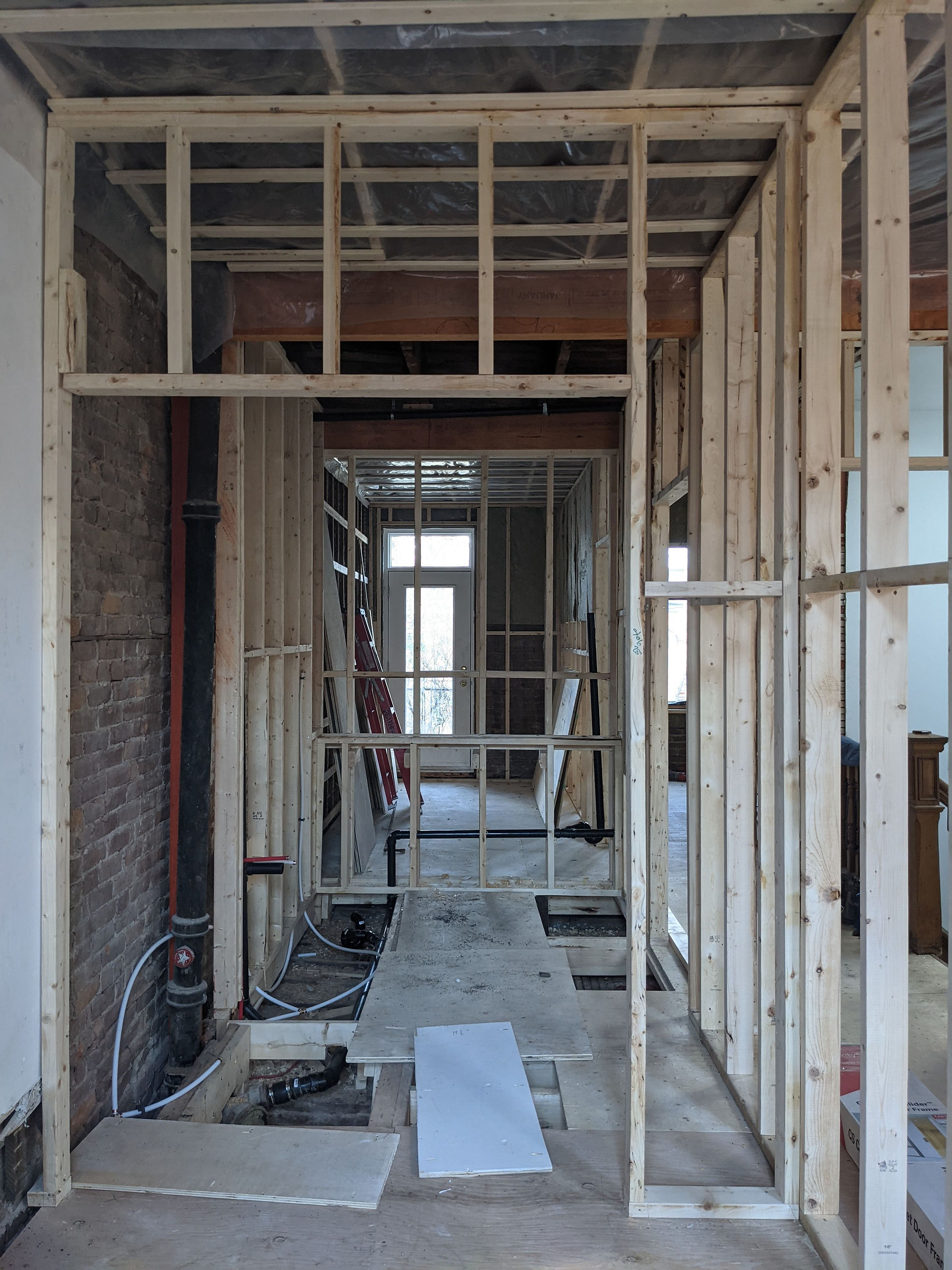 New partitions for a larger main bathroom