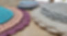 Multiple examples of Tunisian crochet oval placemats