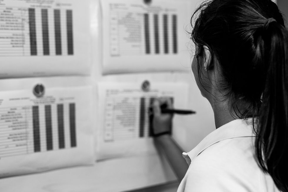 Accredited Exercise Physiologist writes down exercise program