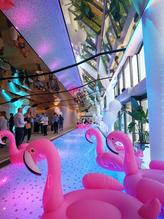 Celebrate 25 years of Trina Solar with a pool party complete with pink flamingos