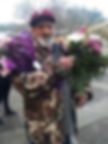 Layla's father bringing her flowers the day she graduated nursing school.