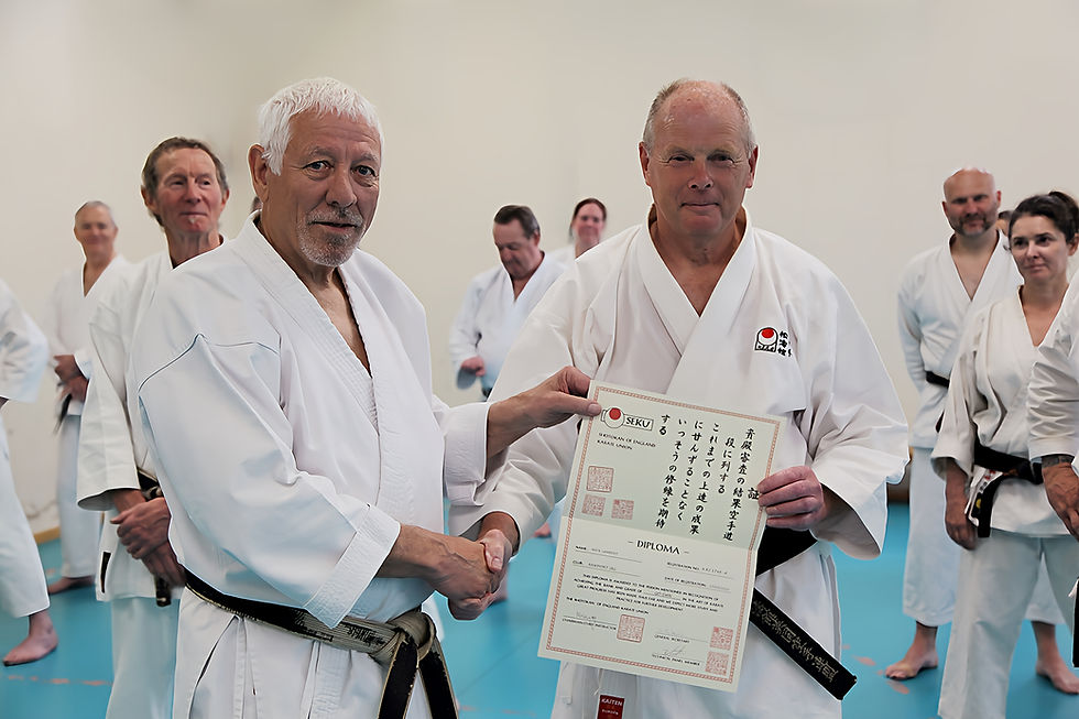 Sensei's Mick Dewey Presentation Mick His 5th Dan diploma