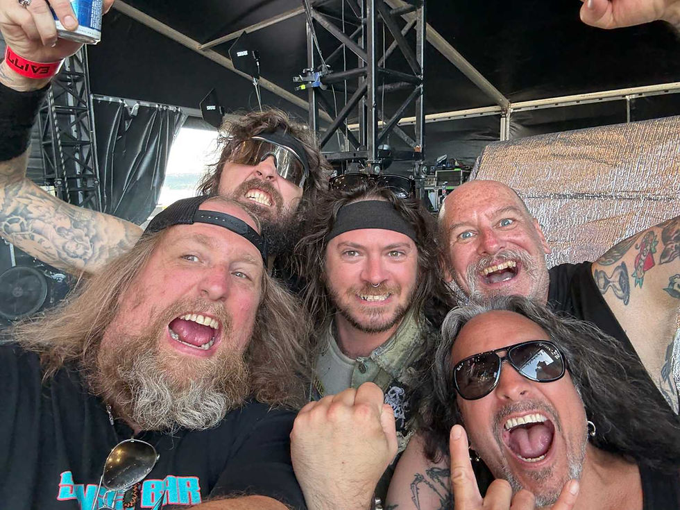 Death Angel and Municipal Waste having fun side stage during Triptykon