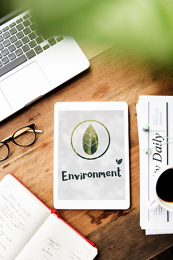 A sheet with environment and a leaf sign on it, symbolising environment policy