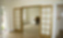 After photo of beautiful open wooden French doors leading into a carpeted living room.