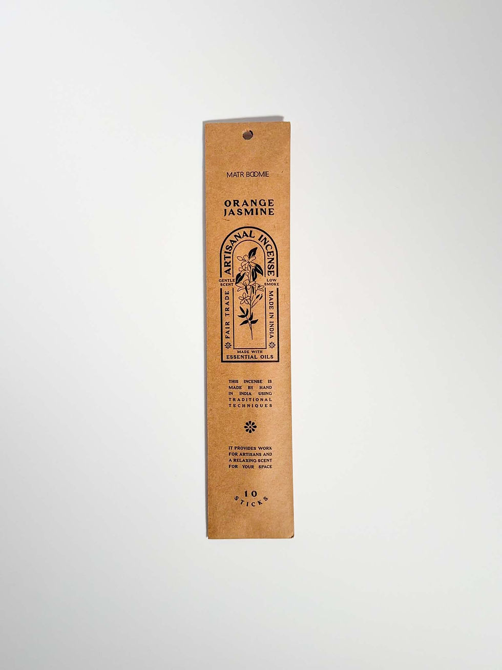 Orange Jasmine Incense On White Counter