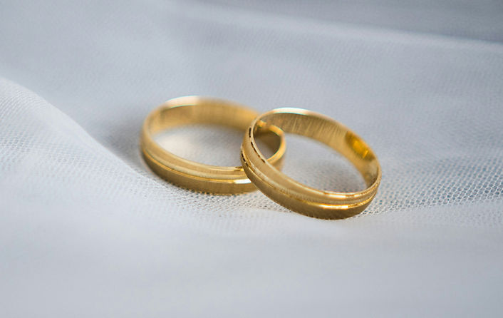Wedding rings on bridal veil._edited.jpg
