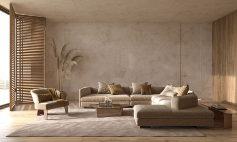 Bright and airy living room with large windows, filled with natural light, and decorated with a white sofa, green plants, and minimalist furniture.