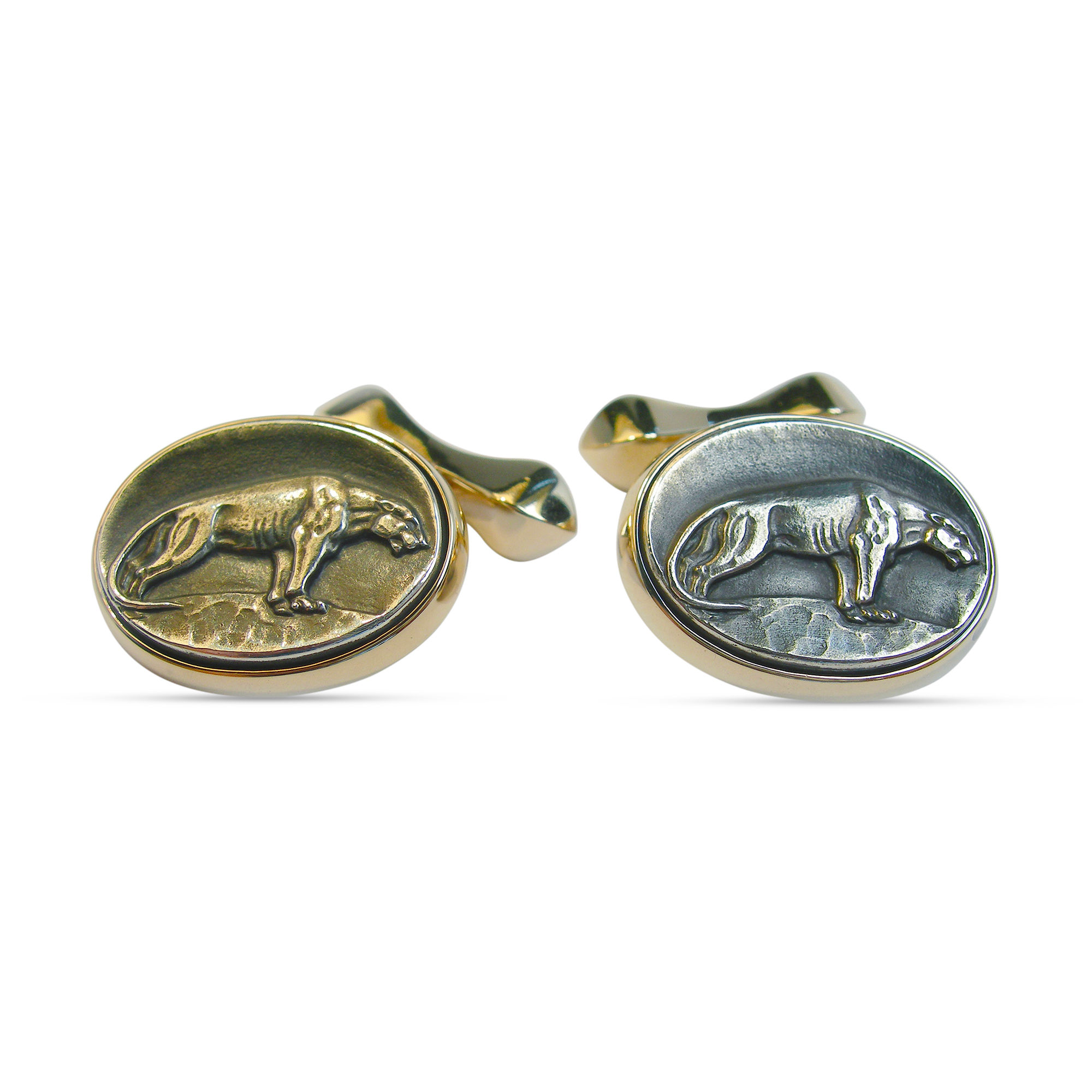 Cougar Cufflinks set in yellow gold and oxidised silver.