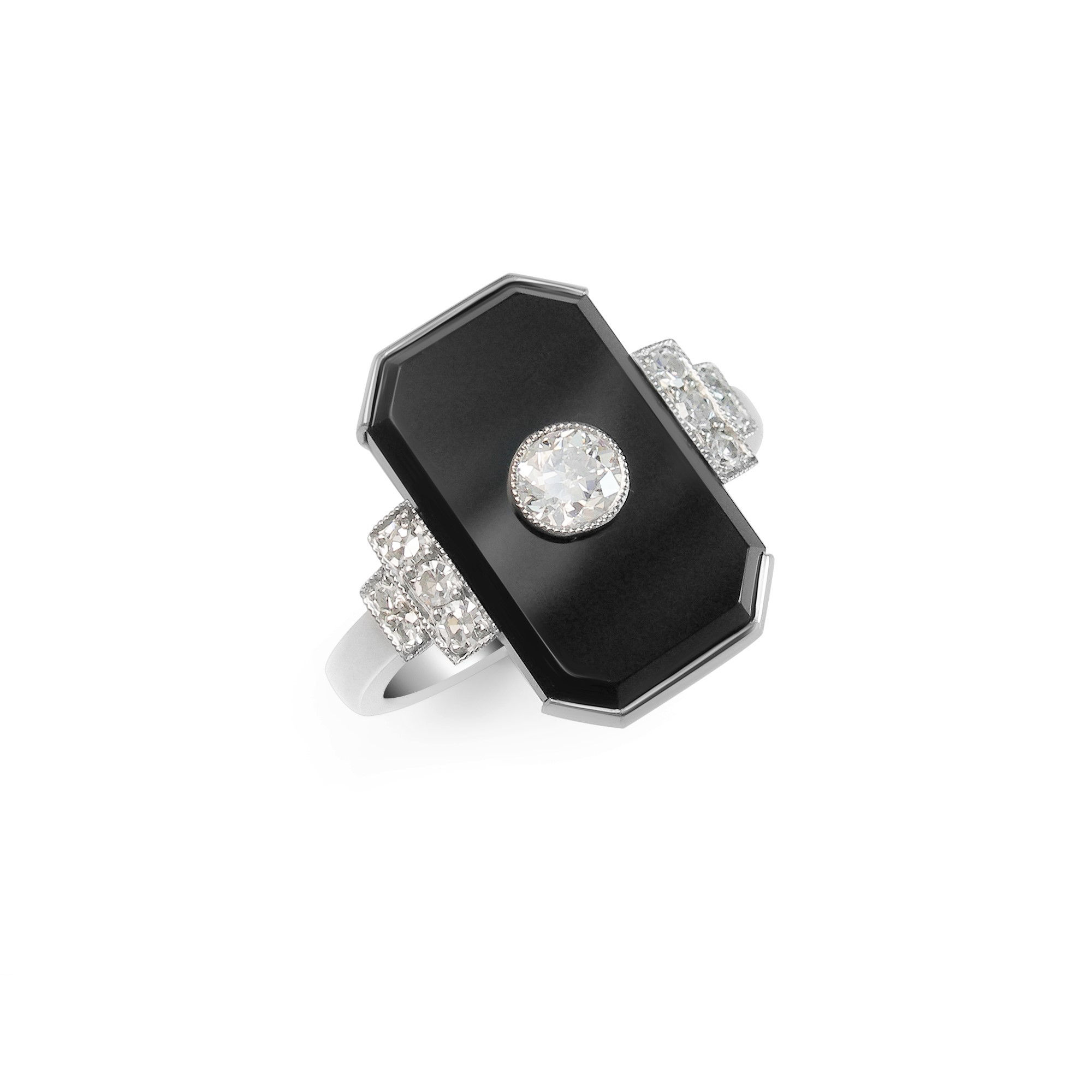 Old European cut diamond set into an emerald cut onyx with stepped shoulder