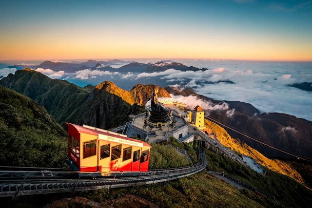 Fansipan, known as the Roof of Indochina, towers majestically over northern Vietnam, offering breathtaking views and a challenging trek to the summit, making it a must-visit for adventure seekers and nature lovers. Photo by Vivu Vietnam on Unsplash