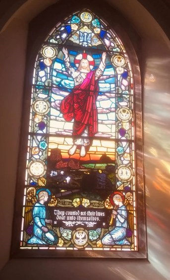 Stain glass window at Applegarth Church