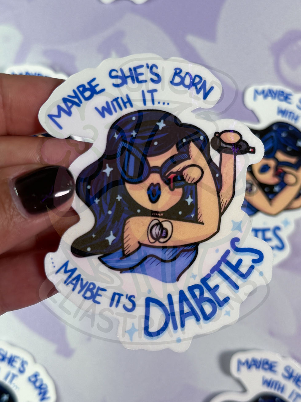 girl in blue with galactic blue hair and showing off a glucose sensor reads "maybe she's born with it, maybe it's diabetes"