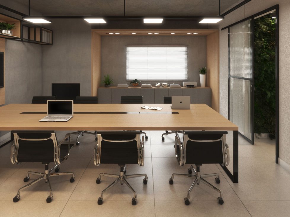 Escritório moderno com mesa de reunião e cadeiras pretas.