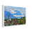 Thumbnail: Charming alpine village with red-roofed houses and church steeple set against majestic mountain backdrop countryside wall art