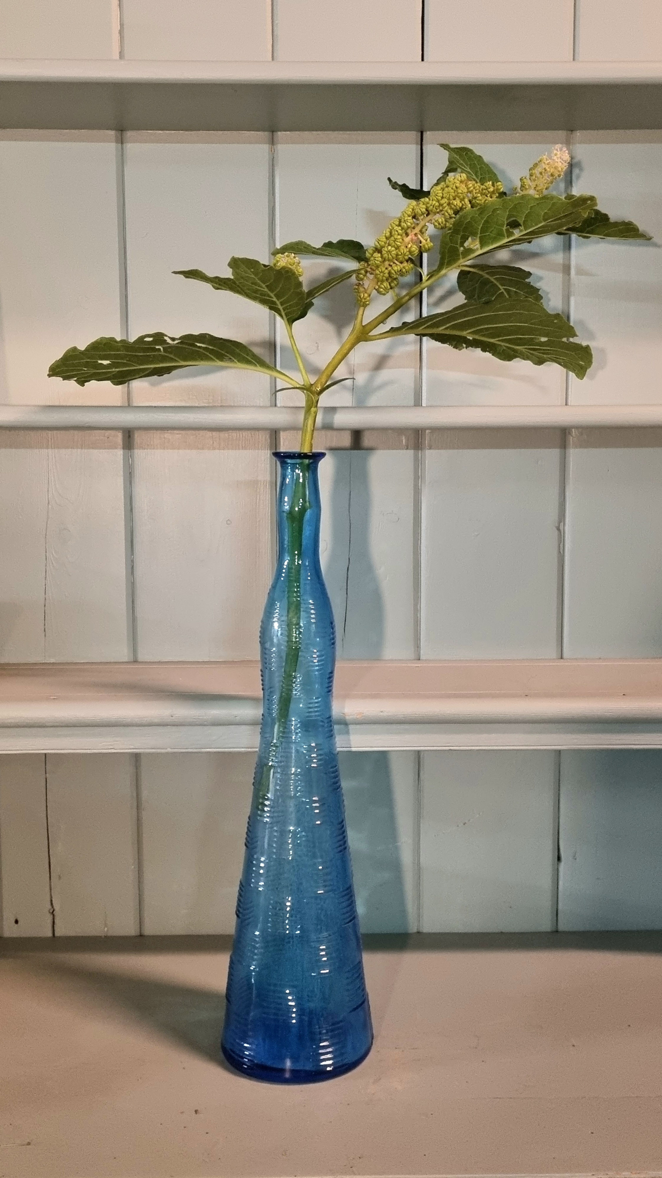 Extra tall blue bottle