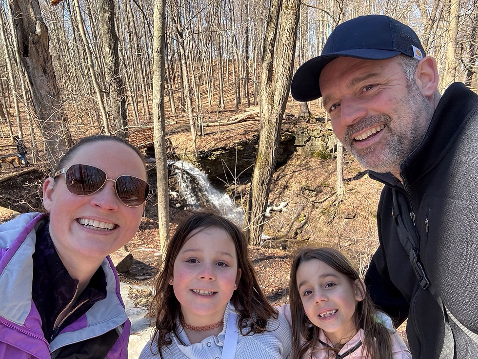 High angle view of family walking carefully on icy trail near Old Dundas Road Falls