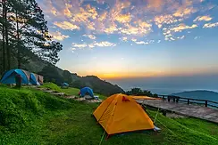 camping-tents-mountain-during-sunrise-chiang-rai-thailand_29778-63.webp