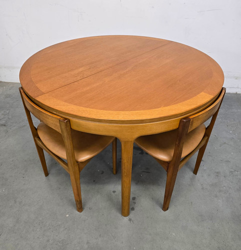 Nathan Round Extending Dining Table & Nathan Space Saving Chairs
