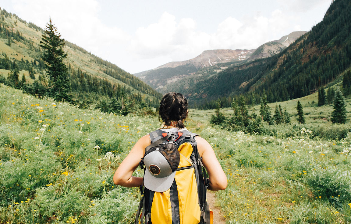 Girl Hiking in Mountains