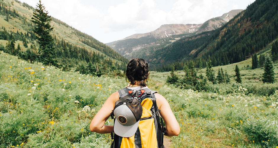 Girl Hiking in Mountains